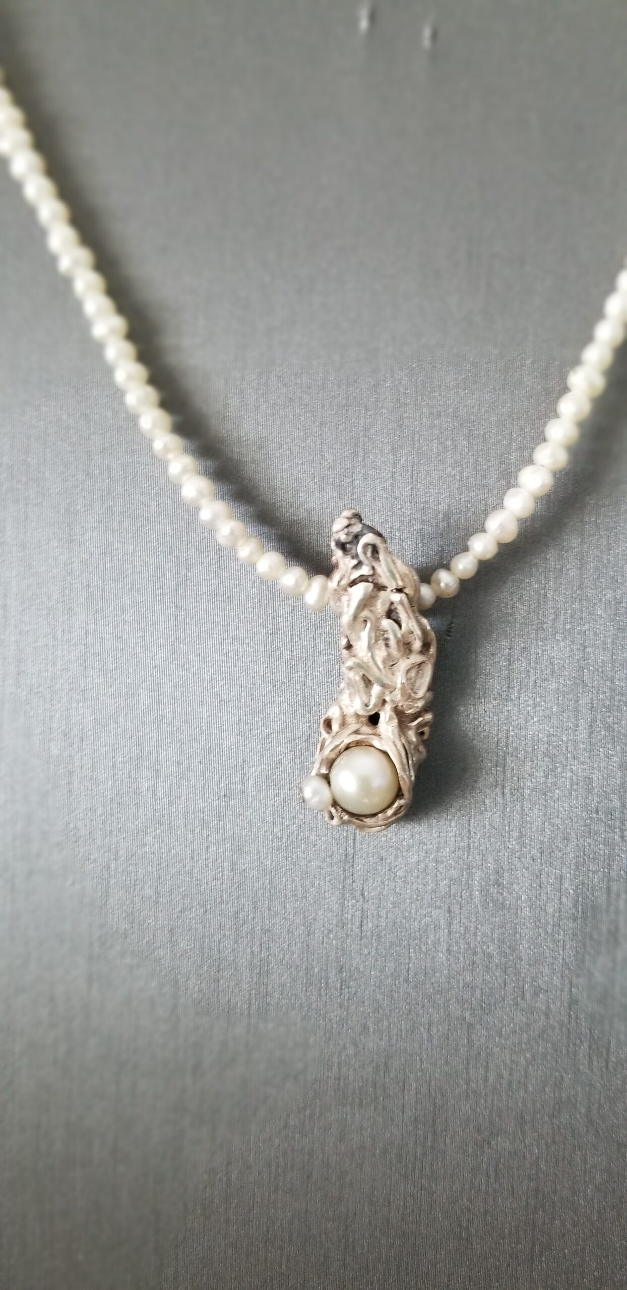 Tiny pearl necklace w/ Art Clay Silver pendant.