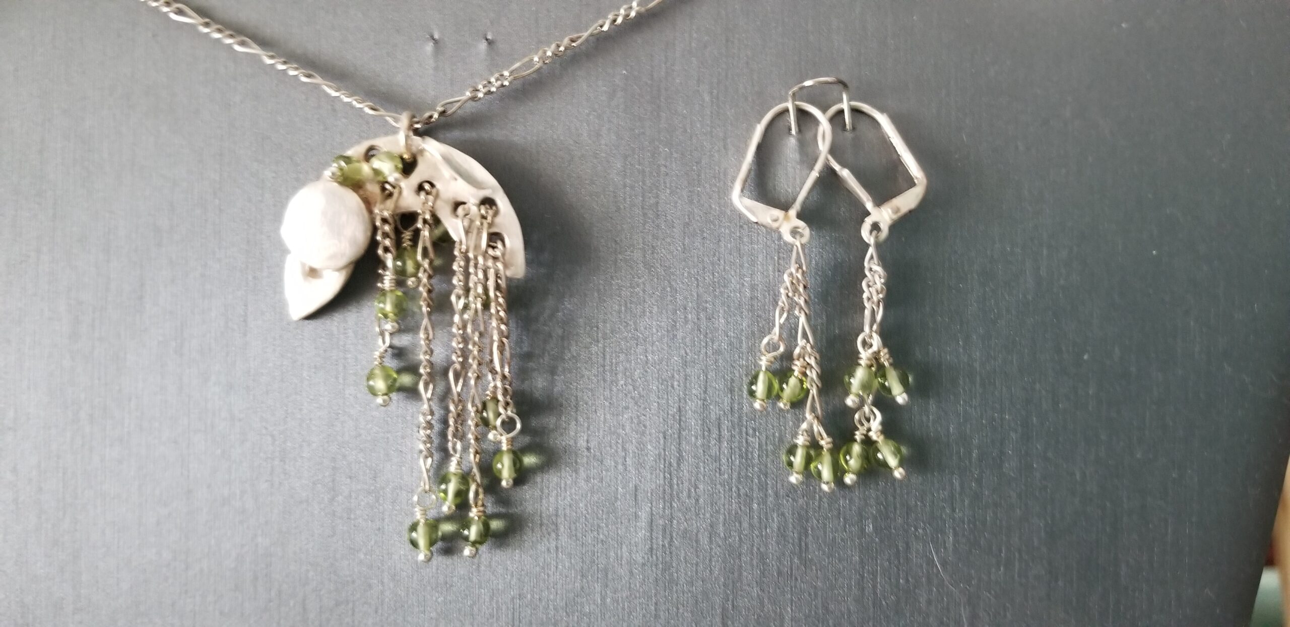 Sun and rainbow w/ peridot, earrings. Art Clay