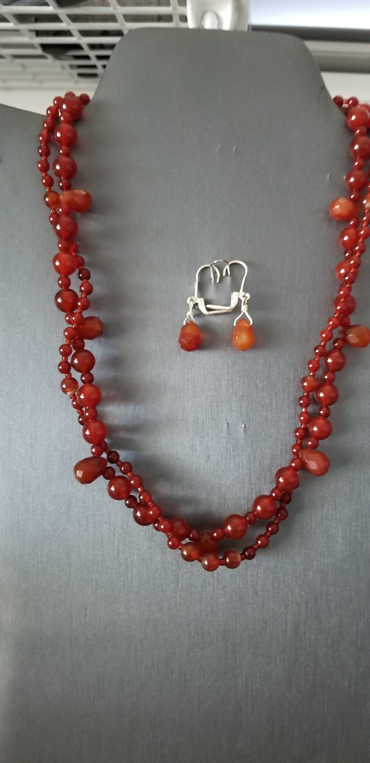 2 strands of carnelian w/ carnelian briolettes w/ matching earrings