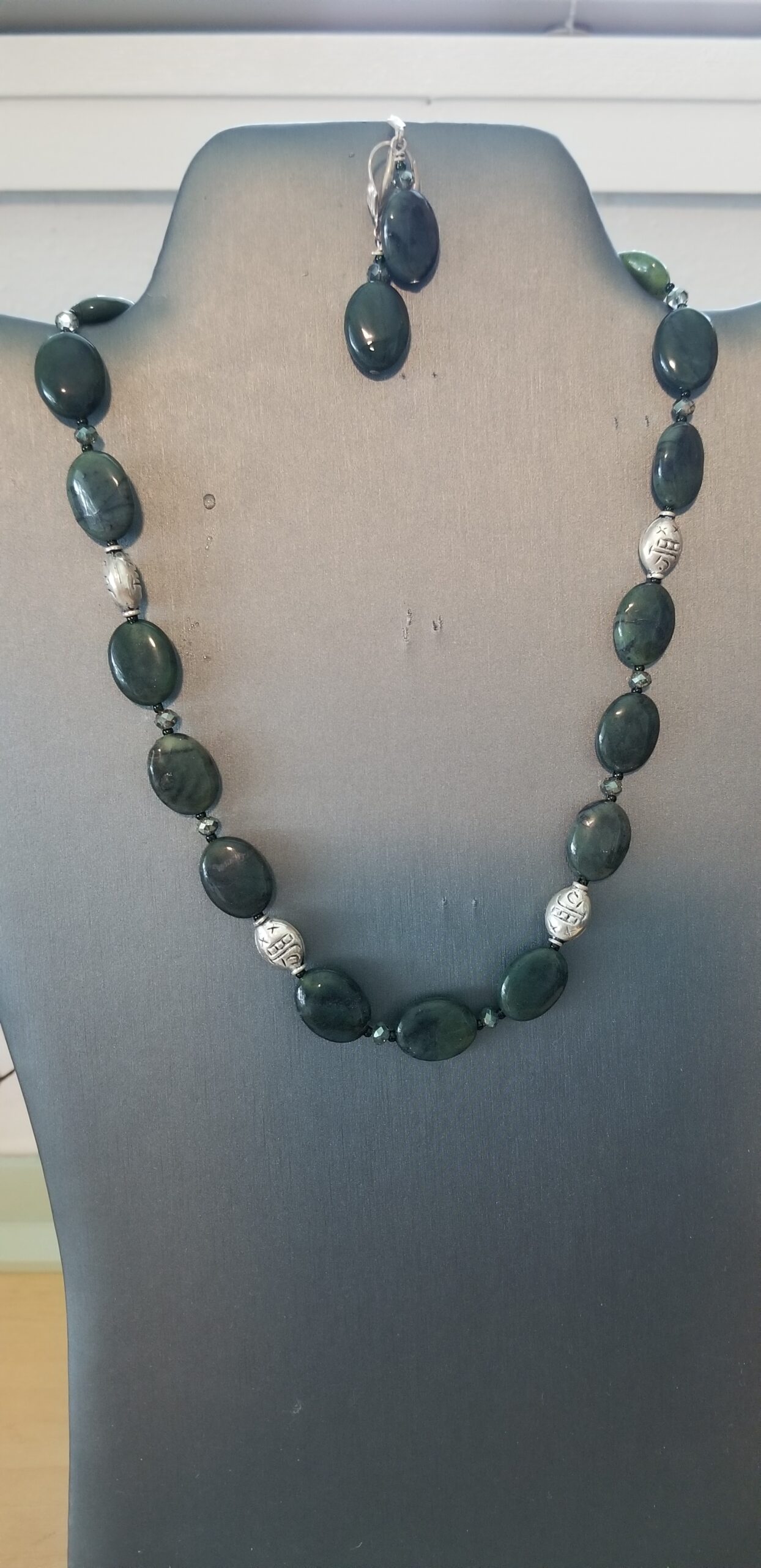 Moss green agate w/ sterling spacers. Earrings