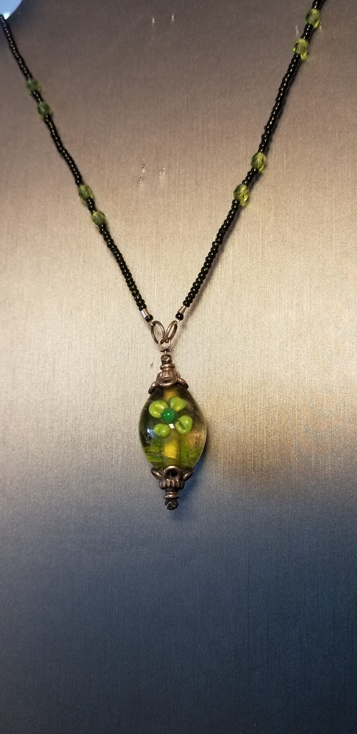 Long seed bead necklace with large pendant of lamp work $40