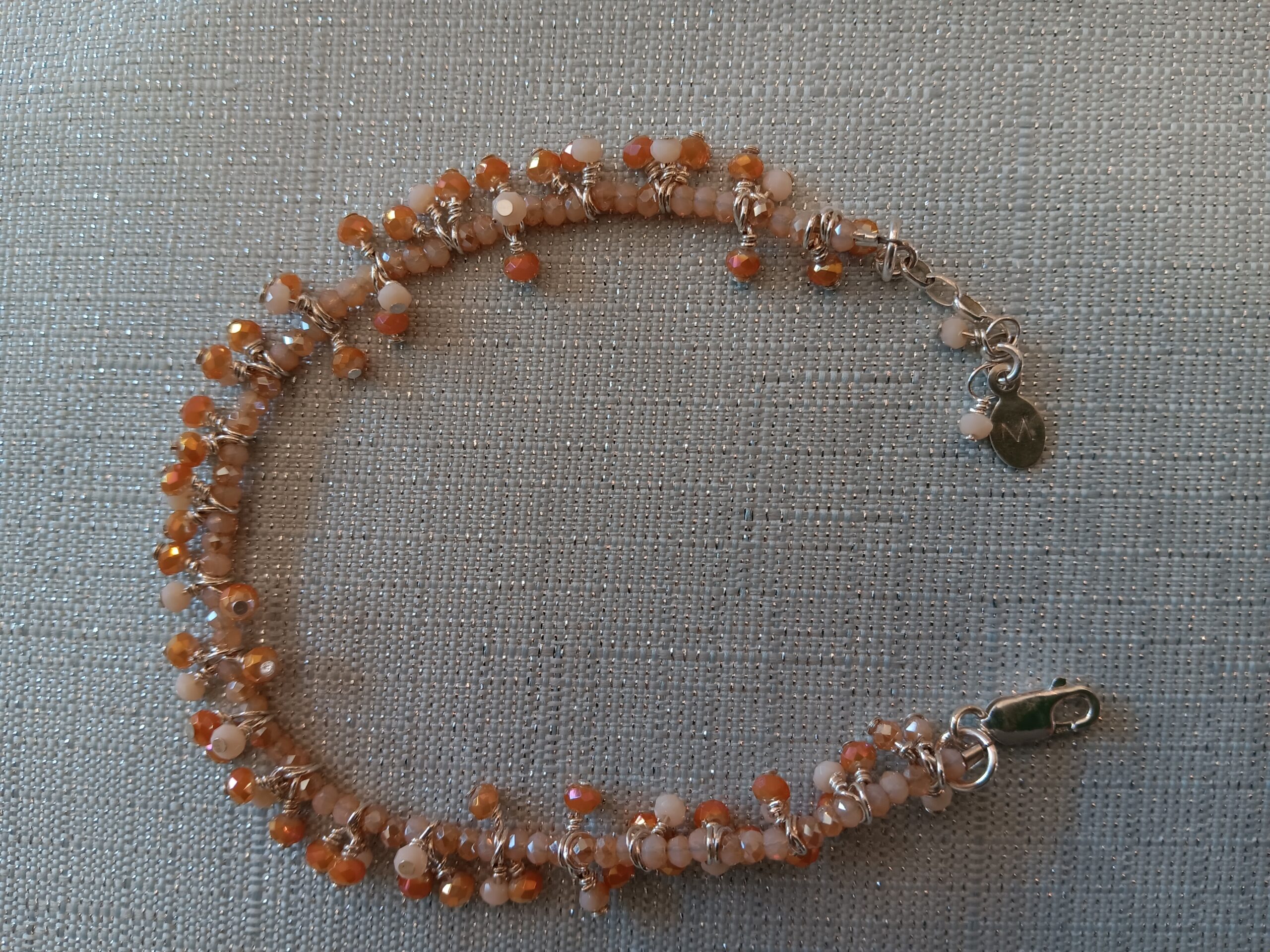 Peach color crystals 'caterpillar' bracelet