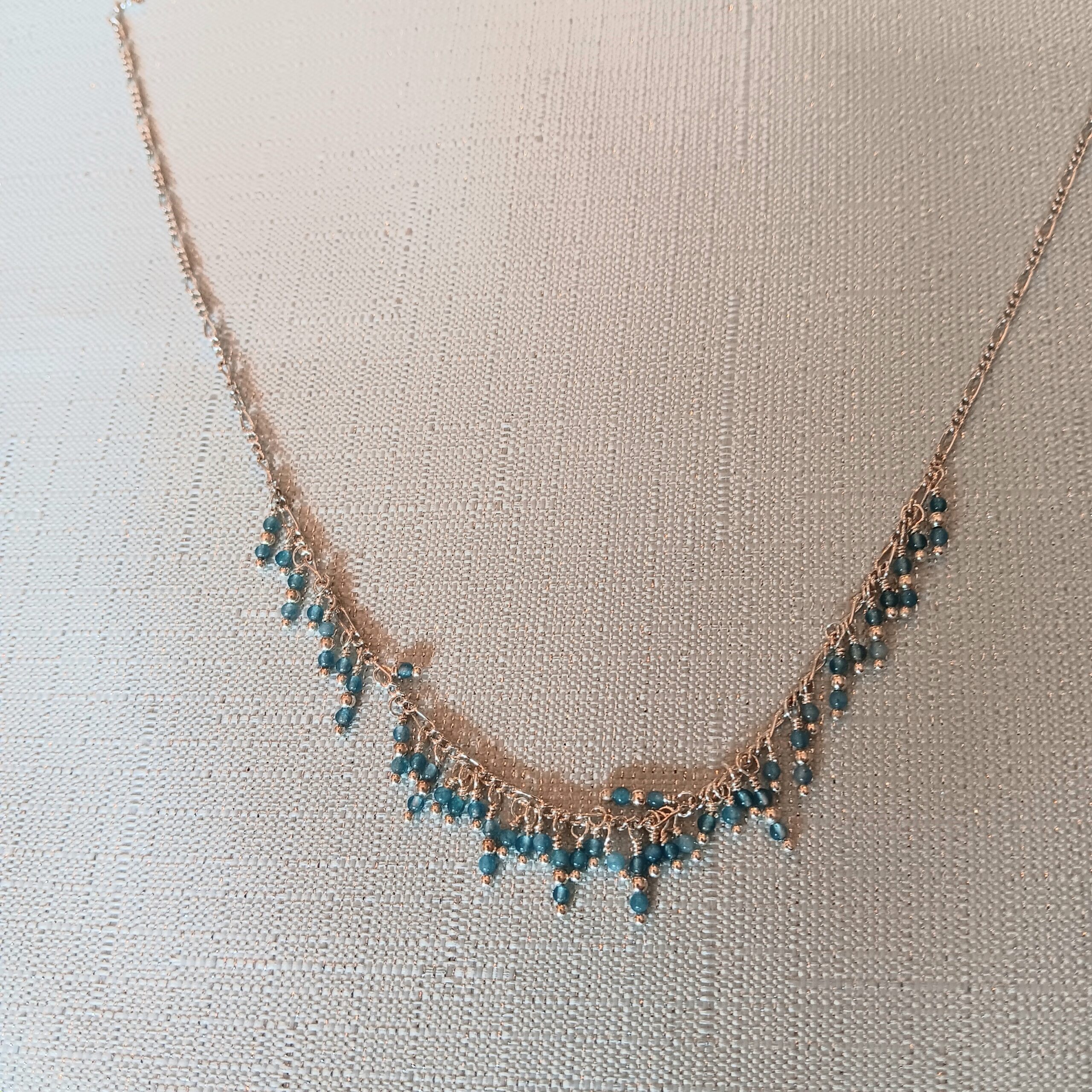 Necklace of tiny blue and sterling droplets