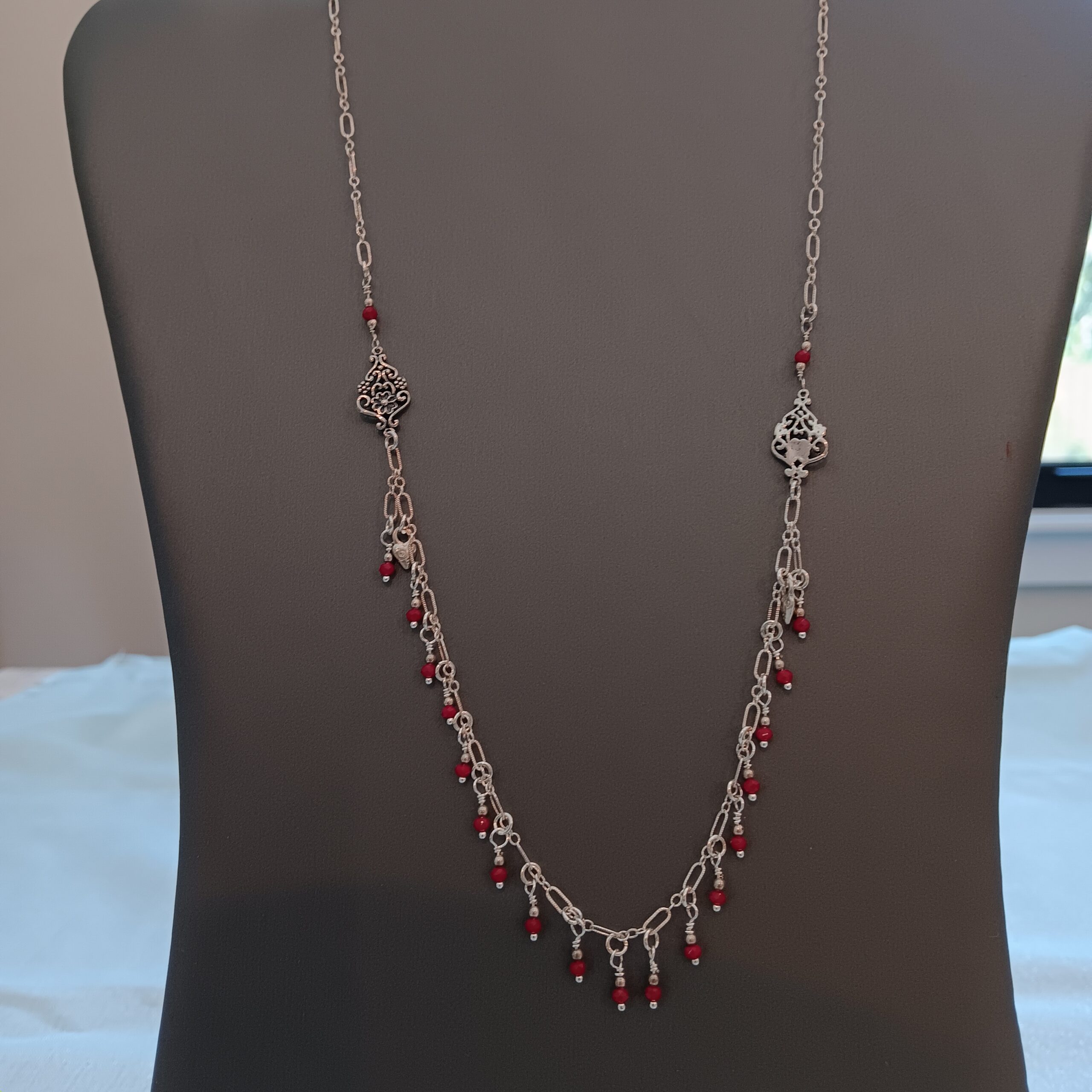 Red crystal droplets from sterling chain