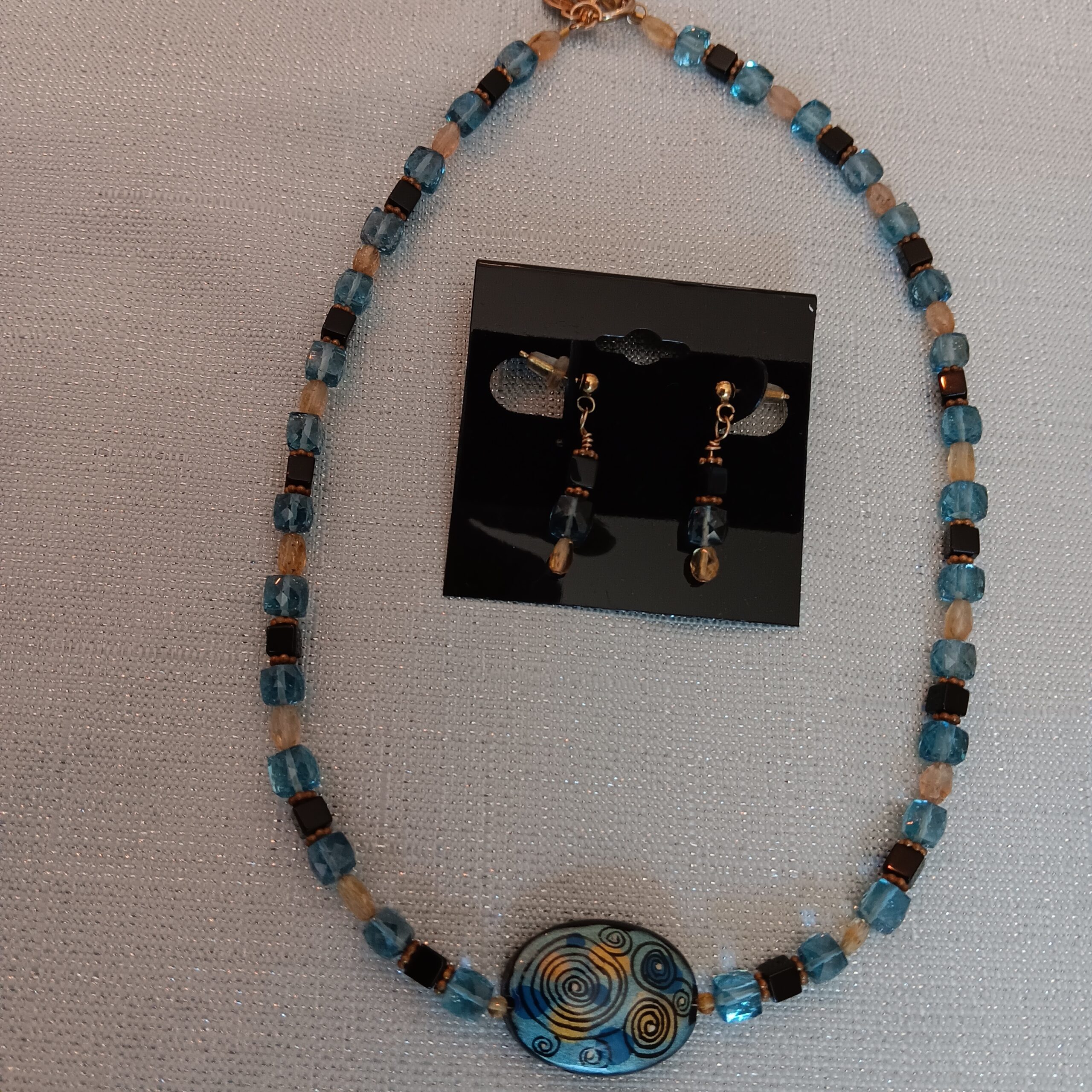 Hand painted focal bead with accenting gems