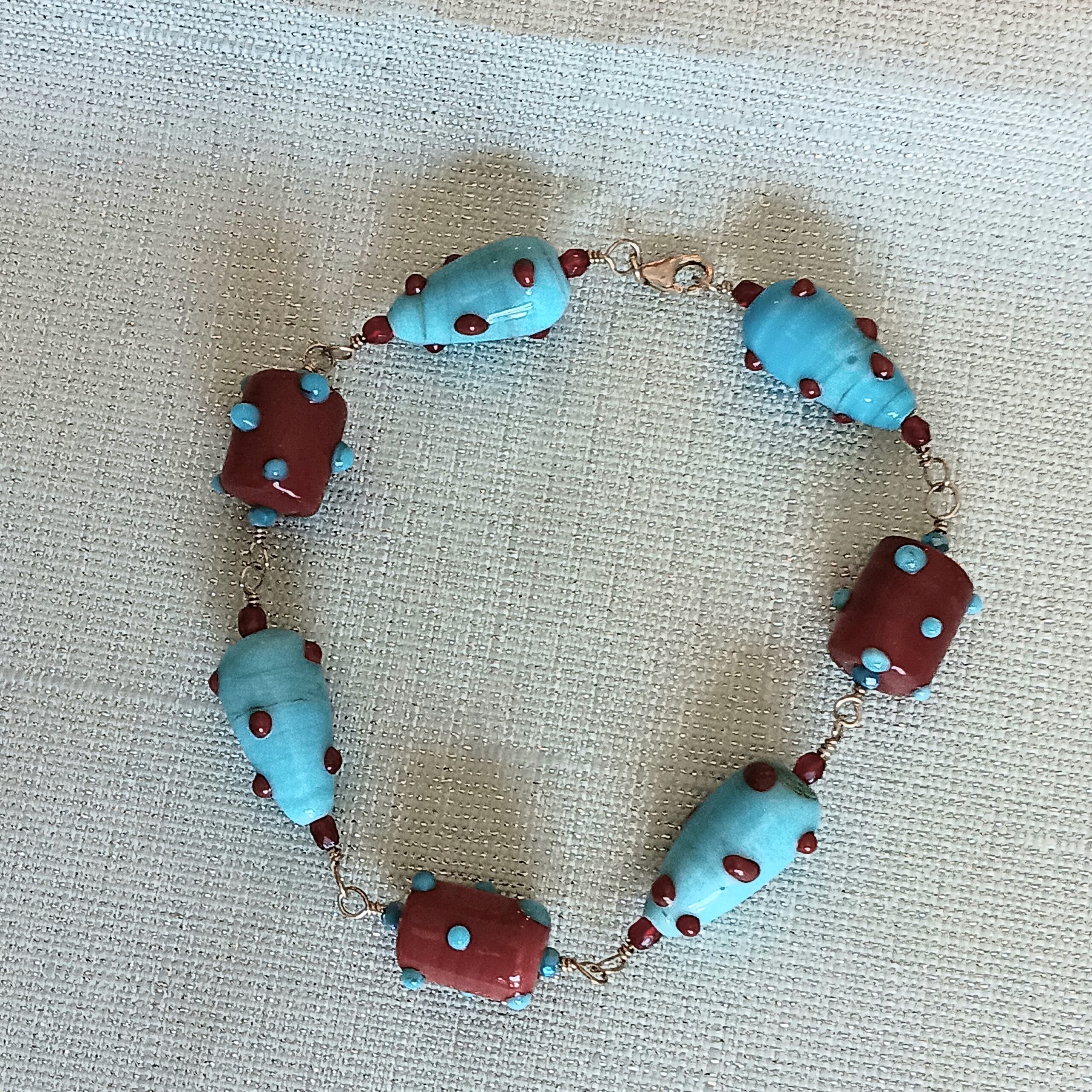 Bracelet of teal/red