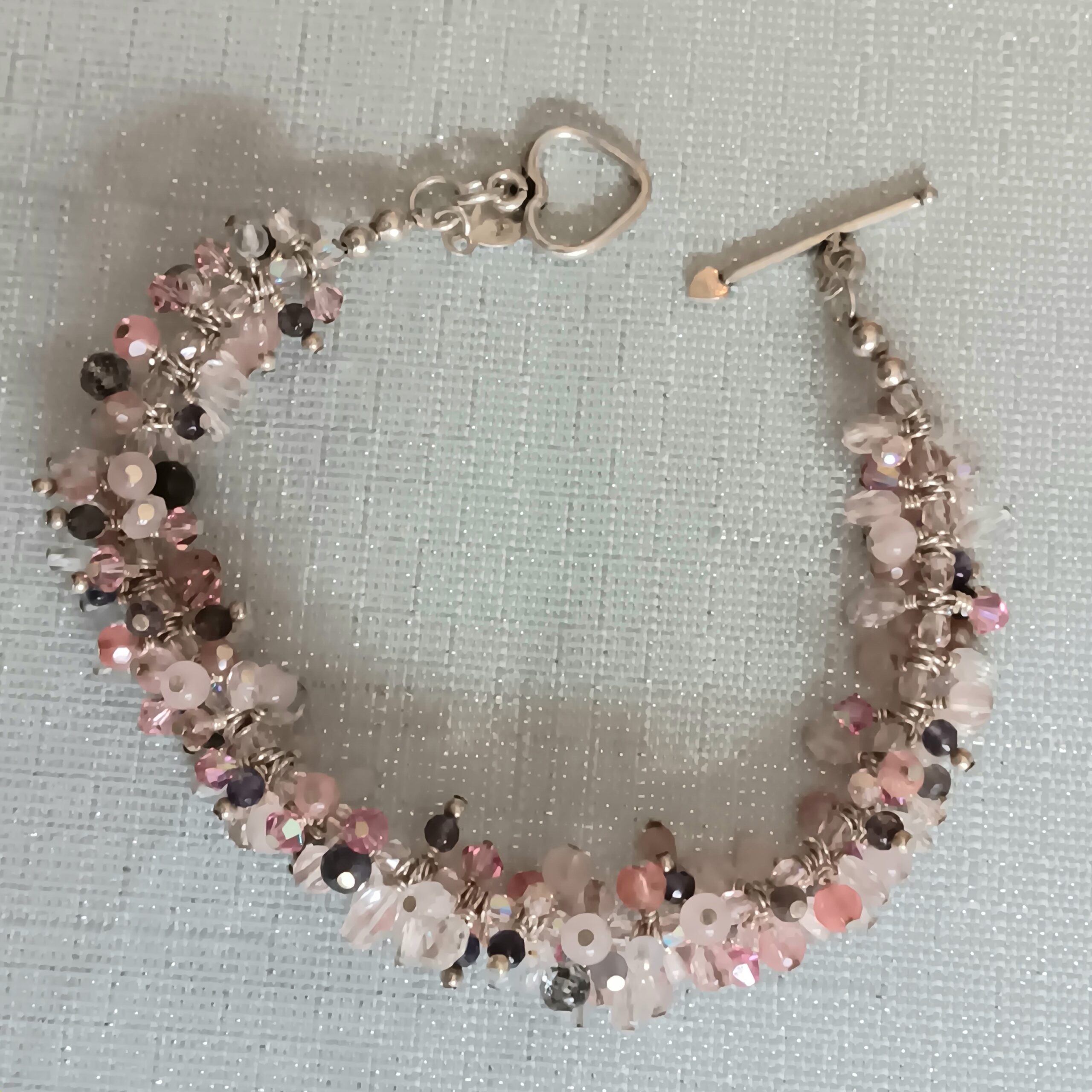 Caterpillar bracelet of pinks and blue